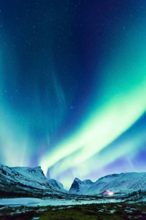 Northern Lights (Aurora borealis) over mountains