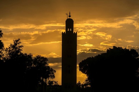 Silhouette of the Minaret of the Koutoubia Mosque at sunset
