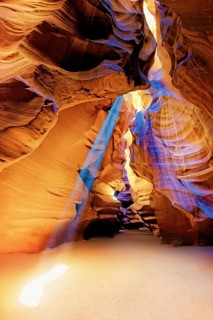 Incident light rays and yellow-red sandstone formations