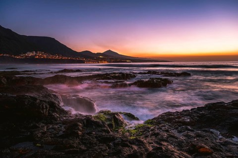 Rocky coast and sea at sunset