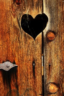 Wooden toilet door with little heart