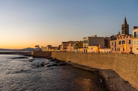 Waterfront in the coastal town of Alghero after sunset