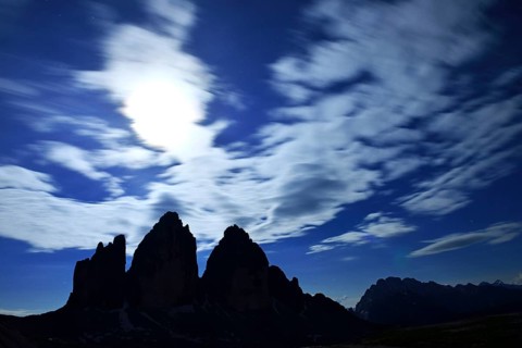 North walls of the Three Peaks of Lavaredo at full moon night