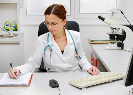 Doctor working at her desk