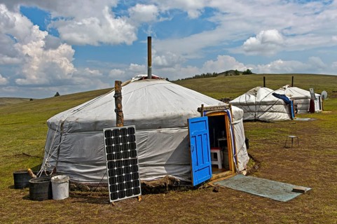 Yurts with solar cell and satellite dish in the steppe