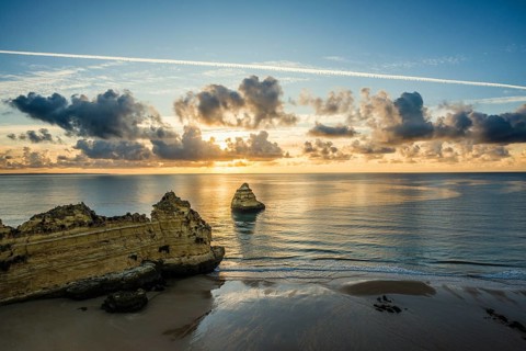Coloured cliffs and sunrise at the beach