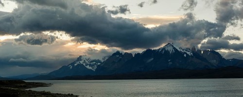 Glacial lake Sarmiento de Gamboa with the Cordillera del Paine mountain group in the evening light