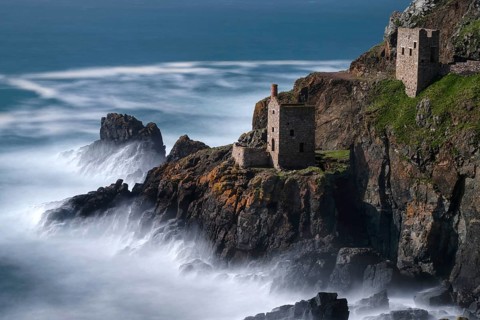 Rocky coast with ruins