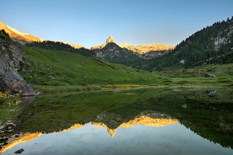 Schottmalhorn reflected in lake Funtensee at sunset