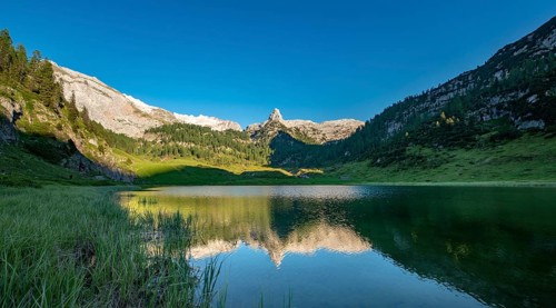 Schottmalhorn reflected in lake Funtensee at sunset