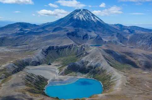 Aerial view of the blue lake before Mount Ngauruhoe