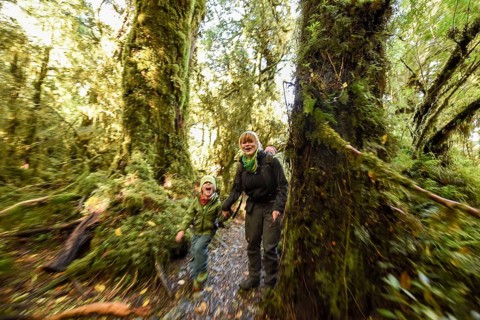 Mother with child hiking in El Bosque Encantado