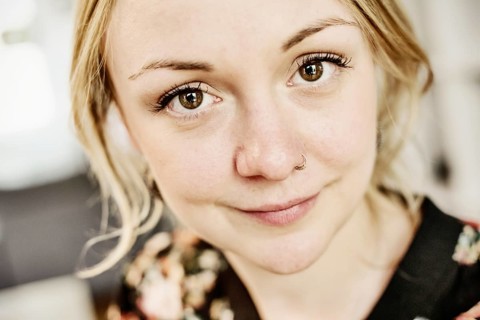 Young woman with nose piercing