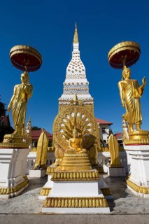 Chedi of Wat Mahathat Temple with Wheel of Life and golden Buddha figures