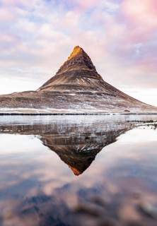 Mount Kirkjufell reflected in the water