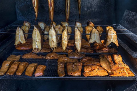 Smoked fish fillets in the smoking cabinet at the river Dahme