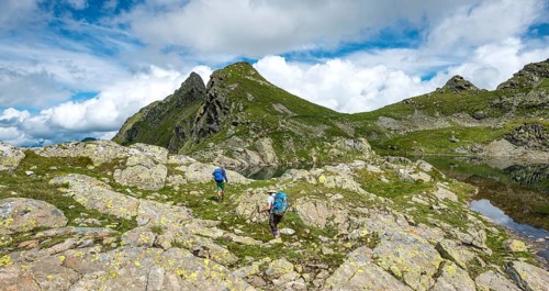 Hikers at a small lake in the Klafferkessel