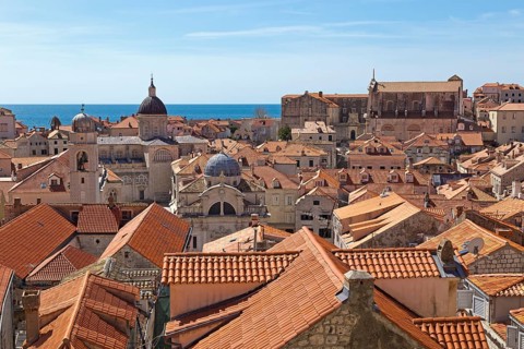 View from the city wall onto roofs of the old town with cathedral