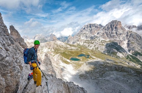 Hiker on the via ferrata to the Paternkofel