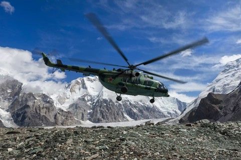 Helicopter landing at the Khan Tengri Base Camp