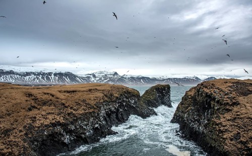 Heavy sea at the coast in a small bay