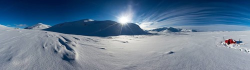 Tent with sun in the snow