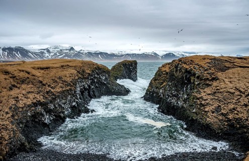 Heavy sea at the coast in a small bay