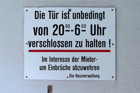 Anti-burglary sign in an apartment building