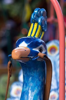 Peacock head of a nostalgic children's carousel