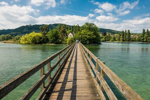 Wooden bridge crossing the Rhine River to the monastery island of Werd