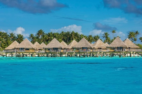 Overwater bungalows in luxury hotel