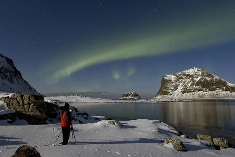 Photographer taking pictures of Polar lights