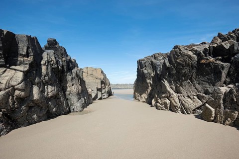 Rock Formation on the sandy beach Saligo Bay