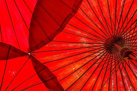 Traditional red opened umbrellas