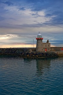 Lighthouse in the harbour of Howth