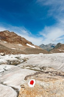 Marked path over glacier tongue below the Schwarzwand summit