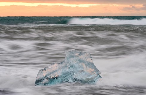 Ice, chunks of ice on lava beach near Jokulsarlon