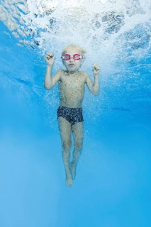 Little boy with swimming goggles