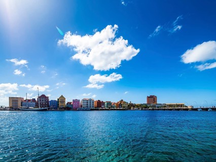 Colorful row of houses in Dutch-Caribbean colonial style on the waterfront