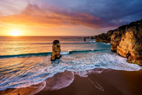 Sunrise on the beach Praia da Dona Ana