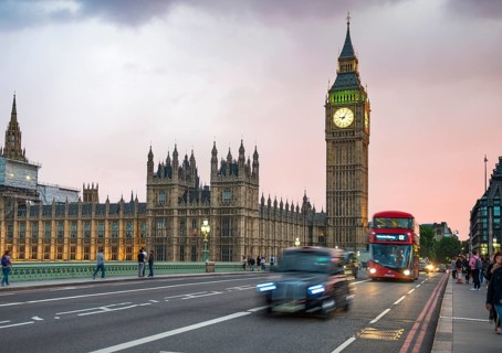Taxi and red double-decker bus on the Westminster Bridge