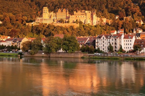 View over the Neckar River of castle at sunset in Heidelberg