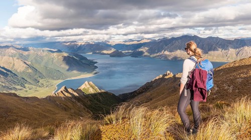 Female hiker looking at lake