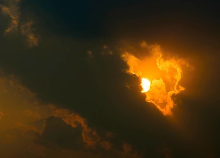 Sunset behind dark clouds