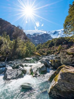Glacial river flowing through mountains