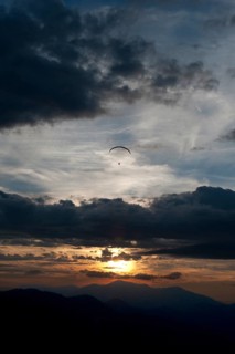 Paraglider flying over Ammertal