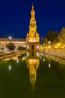 Tower reflected in water basin