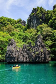 Kayaking in the crystal clear water in the Bacuit archipelago