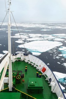 Expedition Boat navigating through melting pack ice