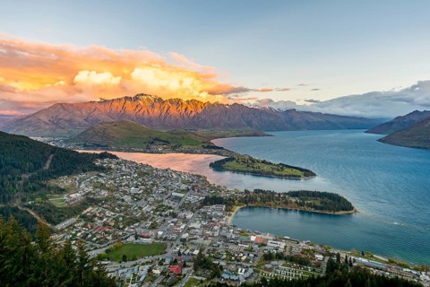 View of Lake Wakatipu and Queenstown at sunset